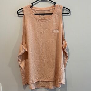 See small spot . Best for xl The North Face Women's Light Pink Muscle Tee